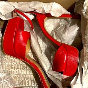 SCORCH RED — a flirty new extra-high heel, dainty ankle strap and airy open toe.